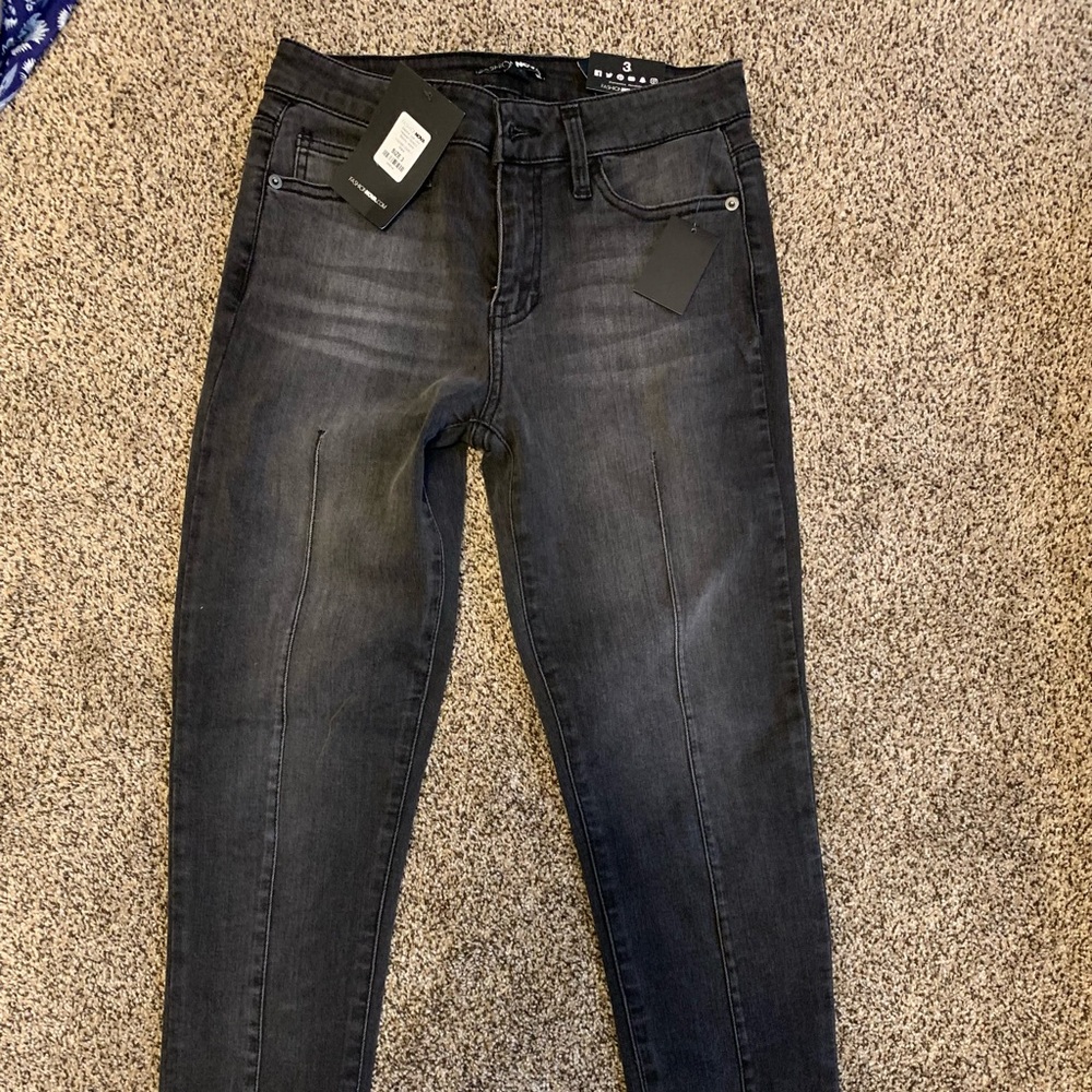 Black skinny jeans from Fashion Nova
